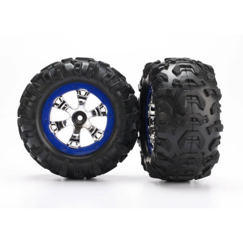 Traxxas 7274 – Tires and wheels assembled glued (Geode chrome blue beadlock style wheels Canyon AT tires foam inserts) (1 left 1 right)